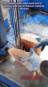 Effortlessly splitting firewood with a powerful hydraulic log splitter machine.