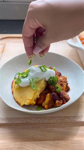 Assembling and baking a chili cornbread casserole