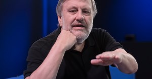 What does Slavoj Žižek mean when he talks about ideology?