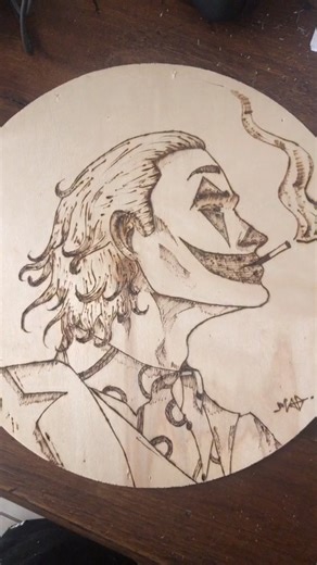 Exploring Joker's Character Through Pyrography Art