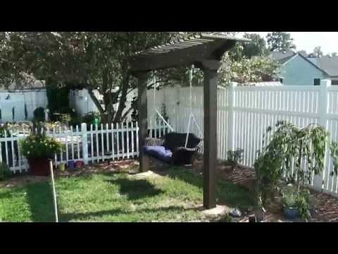 Pergola / Arbor garden swing - wicker & wood