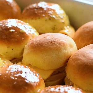 5.6K views · 154 reactions | Recipe here: https://therecipecritic.com/ham-cheddar-sliders/ Ham and Cheddar Sliders are soft and buttery baked rolls filled with sliced ham and ooey gooey cheese. They are the perfect quick and easy crowd-pleasing meal! | The Recipe Critic | Facebook