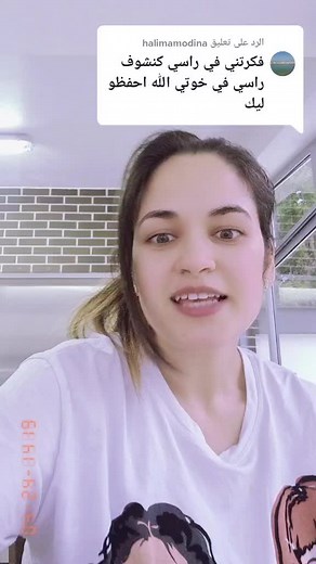 Artistic Hand Gestures in a Stylish White T-Shirt