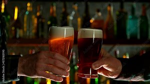 Super Slow Motion Shot of Clinking Two Pints of Beer. Filmed on high speed cinematic camera at 1000fps