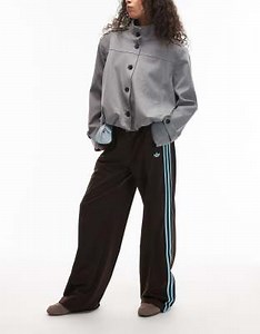 adidas Originals - Firebird - Brune/isblå løstsiddende træningsbukser | ASOS