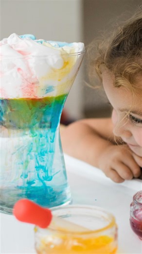 Here’s a bit of fun science to try sometime! . This experiment uses shaving foam to mimic a cloud and what happens when it gets saturated with water droplets and eventually drops as rain. . To replicate this experiment fill a clear jar or vase 3/4 full with water and then squirt a generous amount of shaving foam on top. . Set out water coloured with food colouring and droppers to transfer the water to the ‘cloud’. . We experimented with lots of different combinations of colours and just with blu