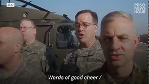 As part of a NewsHour Christmas tradition, the military and the Defense Media Activity Agency provide a special holiday performance of military service personnel playing and singing the “Carol of the Bells.” This first aired on PBS NewsHour in 2017. | PBS NewsHour