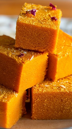 Sanjana Modha on Instagram: "Mango Burfi with tinned mango pulp. This quick and simple recipe for the milky, fudgy South Asian sweet, Mango Burfi requires just a handful of ingredients and the texture is just like shop bought burfi 🙀 1. Melt the butter in a large, non-stick pan. Add the mango pulp and sugar. Stir and bring the mixture to a boil. Once the sugar has dissolved, turn the heat down. 2. Add the milk powder and stir well to combine. You should have a thick paste. 3. Cook this mixture 