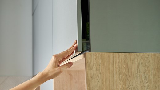 The Simple Solution To Keeping Those Stubborn Cabinet Doors Shut - House Digest