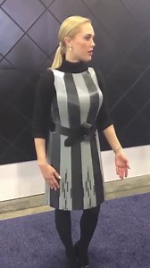  This woman is wearing a programmable dress. By installing thin...