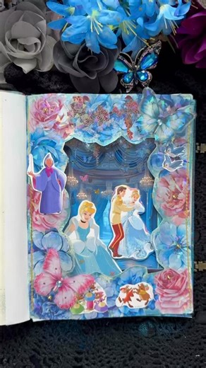 Melinda K. on Instagram: "Fairy tale request! I had to do Cinderella with the beautiful papers from @JournalWithAnto! I hope you like it! #cinderella #creativejournaling #journal #scrapbooking #fypage"