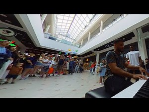 Street piano performance causes standstill in shopping center | Ice Skaters, R.S.I - Karim Kamar