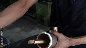 4k Close-up of a craftsman using a vernier to measure the size and distance of a piece of steel.