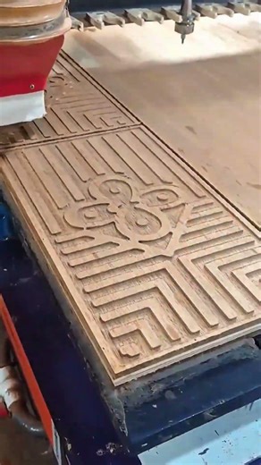 Automated wood carving process using a CNC machine to create intricate geometric patterns on a wood