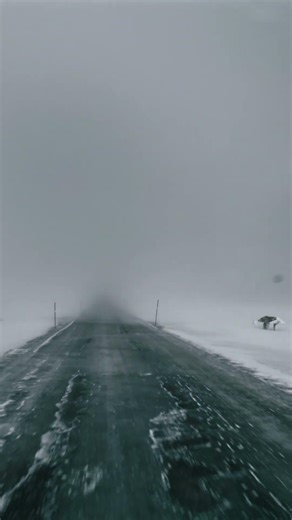 Driving Straight into a Blizzard Wall of Arctic Snow. Heavy Snow Storm & Ice Roads