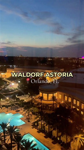 POV: your hotel room comes with a front-row seat to Disney fireworks ✨🎆 Come tour this gorgeous suite at the Waldorf Astoria Orlando 🤍 We stayed on the 8th floor in a spacious suite with two queen beds, and the view at sunset was EVERYTHING — overlooking the pool and golf course as the sky started turning pink 🌅 But then came the real magic… ✨ Sunset views 🏊‍♀️ Pool golf course views 🛏️ Two queen beds 🎆 And Disney fireworks lighting up the sky right from our suite! Because honestly… watchi