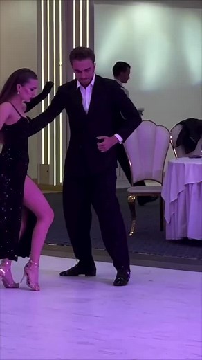 Elegant Ballroom Dance Performance by a Stunning Couple