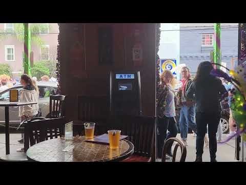 2026 02 16 15 33 56 Live Jazz at Banboulas plus a Mardi Gras parade marching by outside.