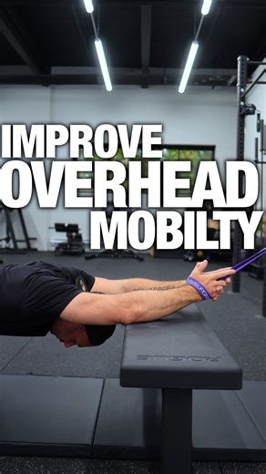 Improve Your Thoracic Extension and Overhead Range of Motion Bad overhead range of motion is one of the biggest letdowns of getting older. After years of poor posture and daily habits, our ability to lift our arms overhead drops fast. The problem is, when you do need to go overhead, whether in the gym or just reaching up at home, you’re likely to compensate and end up hurting yourself. That’s why stretches like this are so effective. This one’s called the Banded Prayer, and it’s great for two ma