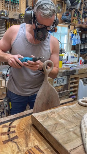 Justin Larson on Instagram: "Today in the shop I power carved this serving board handle. Carbide burr bit in a die grinder hooked up to a variable speed controller to slow it down and not burn the wood 👌🏻👌🏻 #woodwork #woodworking #woodworker #handsthatmake #woodtexture"
