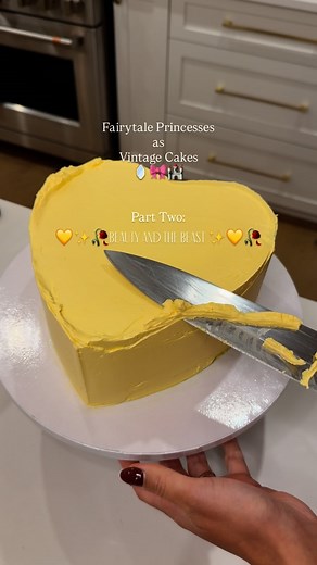 Vintage Cakes | Guelph Cakes on Instagram: "🥀 Part Two: The Beauty and the Beast Cake 🥀💛 – yellow swags and delicate piping inspired by Belle’s iconic ballroom gown 💛🌹🏰 If every Disney fairytale princess was reimagined in buttercream… this would be Belle’s cake🥀💛 Part One: Sleeping Beauty 💜💤 Part Two: Belle 💛🥀 Part Three: …. ?? 👠🍎🕊️👑 P.S. This dreamy yellow is LEMON by @colour.mill 🍋 Tag @colour.mill below to get my special discount code so you can scoop up this stunning shade .