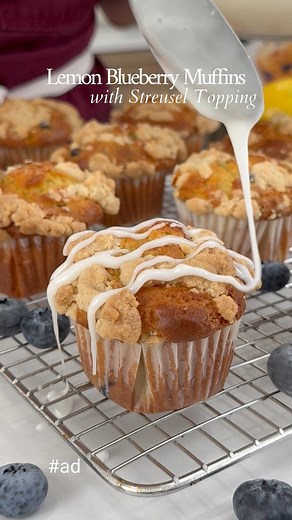 Brighten your day with these Gluten Free Lemon Blueberry Muffins, topped with a buttery streusel crunch! These tangy & sweet morsels are the ultimate taste of Spring! Thanks to The Salty Cooker for this delicious inspiration. | Krusteaz