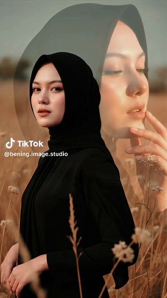 Prompt Sebuah potret double exposure artistik yang memadukan dua citra berbeda namun harmonis, menciptakan komposisi yang lembut, etereal, dan penuh makna. Di latar depan, tampak siluet seorang wanita berhijab dengan tubuh menghadap kekiri wajahnya menoleh ke kamera, kain hijab hitam lembut membingkai wajahnya yang menawan, bibirnya terbuka halus dalam ekspresi lembut dan penuh renungan. Ia mengenakan atasan hitam sederhana dengan potongan minimalis yang menonjolkan kesan modern dan elegan. Post