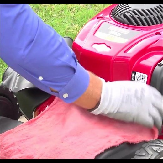 How to fix a mower with a stuck pull cord after tipping it over
