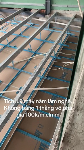 Metal Framework Installation at Indoor Construction Site