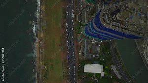 High angle view of construction of modern high rise buildings in urban district at seaside. Colombo, Sri Lanka