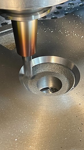 Cleaning up the angular counterbore in the Hardtail vise swivel base. I’m using 2D Bore in Fusion for this op and looks as though the @waltertools endmill is doing a great job. I’m new at using this program so I’m unsure of the ideal pitch to use but I landed on .020” to help keep the cycle time down and provide what I hoped to be a good looking finish on the wall. We cleaned up the bottom face about .050” to provide the needed clearance for the swivel bolt. Once the main vise body and swivel pl
