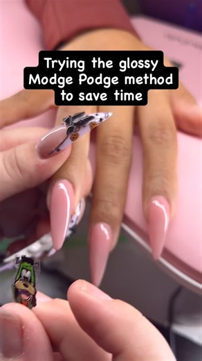 Gorgeous Ten on Instagram: "ALL NAIL TECH HAVE TO TRY MODGE PODGE NO JOKE @hippie_vibe_nails said to use two thin layers of glossy modge podge to do nail art instead of base coat. When I tell you it changed my life. It stuck itself to the nails. No glue needed but I did you some more builder gel to encapsulate it. Me and my girl @gissxellee @glossedbygisselle were so amazed. ⭐️Character designs by @nailsbyjanine.x Thank you for this tip queen you deserve all the flowers @hippie_vibe_nails 💐👑 #