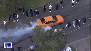 It might have looked like a fire at first glance, but video captured by the #9News helicopter shows multiple cars performing burnouts at a wedding in south-western Sydney. Several onlookers can be seen cheering and filming the reckless spectacle while the hooligans tore up a Bass Hill road just after midday. See the full story at 6pm on #9News | 9 News