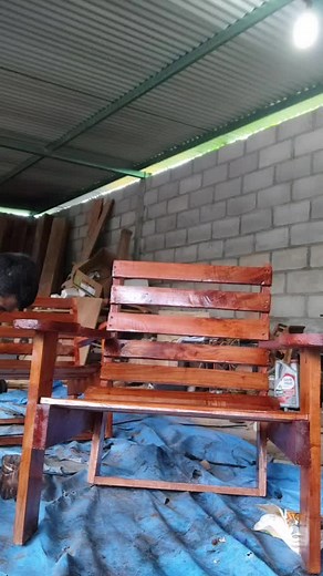 Sanding a Wooden Bench with Safety Precautions