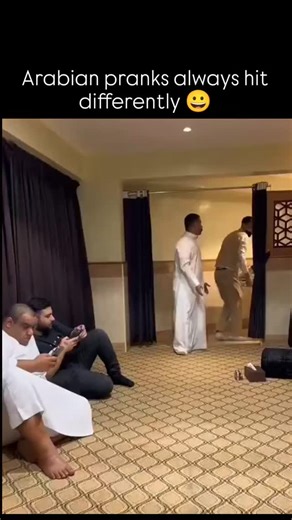 rofalvibe on Instagram: "The post shares a 30-second TikTok video depicting an Arabian prank where a small man is wrapped in foil and hidden under a large metal serving tray during a gathering, surprising onlookers who react with shock and laughter upon his reveal. Released on December 7, 2025 , it quickly amassed 11,500 likes and 912,000 views, demonstrating the viral potential of physical comedy that blends cultural elements like traditional attire with universal surprise humor. User replies f