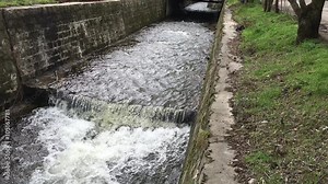 Slack water on the river rushes through the stone of the riverbed