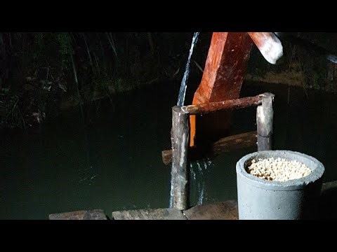 Using a stone mill and water pressure to make corn kernels./P81