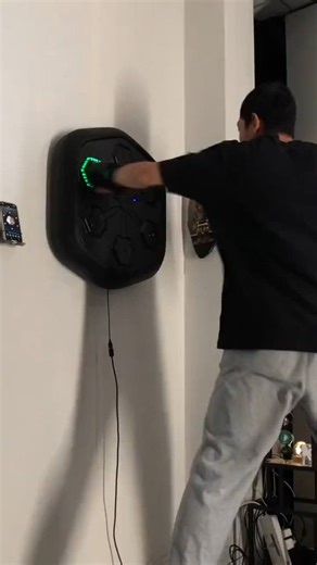 Music Boxing Training Machine. Link in comments to Purchase Introducing the revolutionary Music Boxing Training Machine, a game-changer in the world of fitness and boxing enthusiasts. This cutting-edge device combines the power of music with the intensity of boxing, delivering an exhilarating workout experience like no other. Designed to enhance your training routine, the Music Boxing Training Machine immerses you in a high-energy environment, syncing your punches and movements with an adrenalin