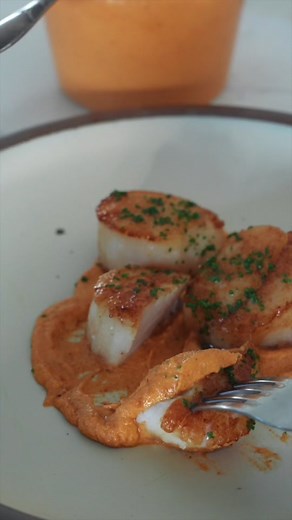 Scallops with romesco Ingredients: Sea scallops 5 Roma tomatoes 1 red bell pepper 8 cloves garlic 1/4 cup almonds 1/4 cup hazelnuts 1 slice bread 2 tbsp smoked paprika 1/4 cup olive oil (a nice one) Sherry vinegar to taste Salt to taste To finish: 1 lemon squeezie Chives Directions: Start by charring your pepper all over and covering to steam, making it easy to peel. Once it’s cooled remove the seeds and peel the skin. Broil your tomatoes until charred on all sides and then proceed to peel and r