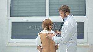 Doctor Examining Patient with Stethoscope Stock Footage - Video of chest, lung: 66008648