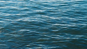 Blue sea water texture waving gently - Free Stock Video