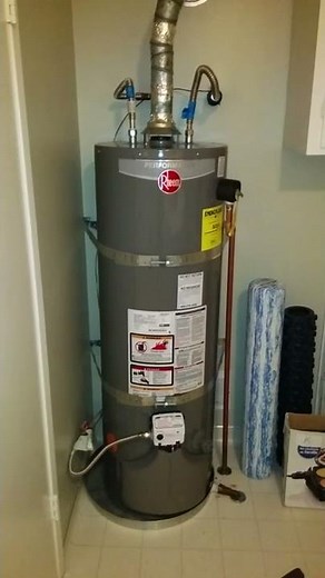 Rheem gas water heater with delayed ignition problem - explosion and blue flame at vent