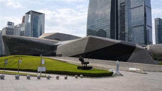Architectural contrast in China shows a building unlike others nearby