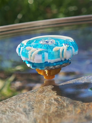 Drain Fafnir Crystal Blue ver. beyblade spin appreciation. Okay guys I think I got new fav beyblade 🤩 this clear blue it's so so beautiful, and yes this is rare AF. I took out his normal chip and I put the crimson ver. one cause I got a spare one and the color fits perfect. Hope you enjoy it and thanks for the support 😊 #beyblade #beybladeburst #takaratomy #drainfafnir #fafnir