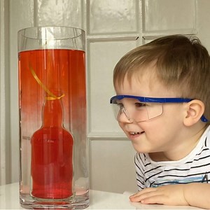 We can't stop doing amazing science experiments with Alex and Max. Today it was time for Underwater Volcano in a vase. When a bottle with coloured warm water was submerged in a vase with cold water, it started spreading colour. That looked really mesmerising. Then we added ice cubes that made red warm water on the top cool down and move to the bottom of the vase #TheDadLab #parenting #science | TheDadLab