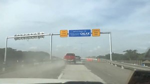 LOOK: Cavite Laguna Expressway (CALAX) amid the ashfall due to #TaalVolcano's activity. | via Sandra Aguinaldo/GMA News Abangan ang 24 Oras para sa pinakabagong balita tungkol sa sitwasyon ng Taal Volcano. | RELATED STORY: http://bit.ly/36PrU9h | GMA News