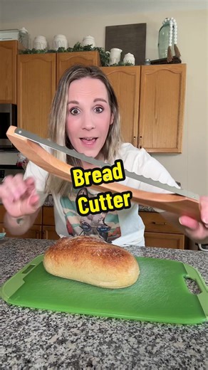 If you’ve ever tried cutting fresh bread and squished the whole loaf… you need this bread cutter 🍞🔪 perfectly even slices every time #kitchenfinds #bakinghack #kitchengadget #homebaking #tiktokshopfinds