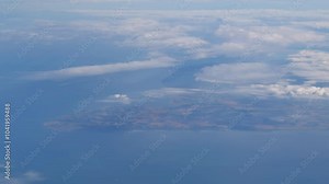 beautiful canterbury coastline england seen from airplane cruising high altitude clouds partially cover creating panning shot view uk cloud aviation scenic