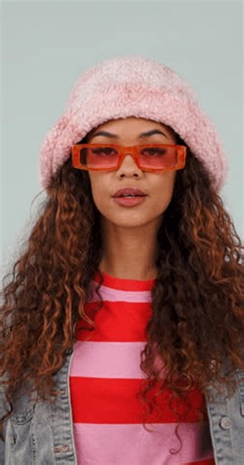 clip-4103128235-face-sunglasses-woman-studio-wink-facial-expression