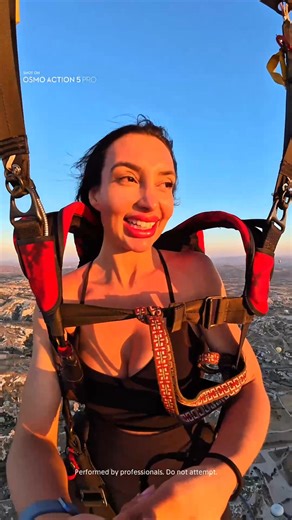 Crazy hot-air-balloon skydiving with #OsmoAction5Pro 🤯 She smiles under a sky painted in blue and gold — fearless, free, and full of life. 🪂✨ 🎬 luasferrari #DJI #DJIOsmo #Skydiving #ActionCamera #ExtremeSports #AdventureVibes #Freefall #AdrenalineRush | DJI